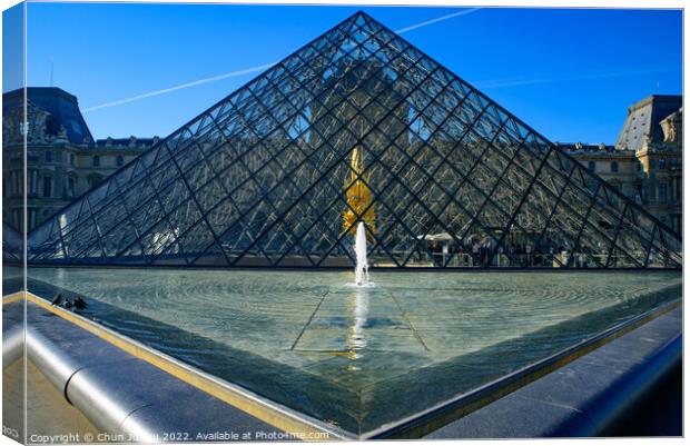 The Louvre Pyramid in the main courtyard of Louvre Museum in Paris, France Canvas Print by Chun Ju Wu