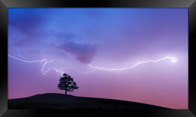 Silhouette Lightning  Framed Print by John Finney