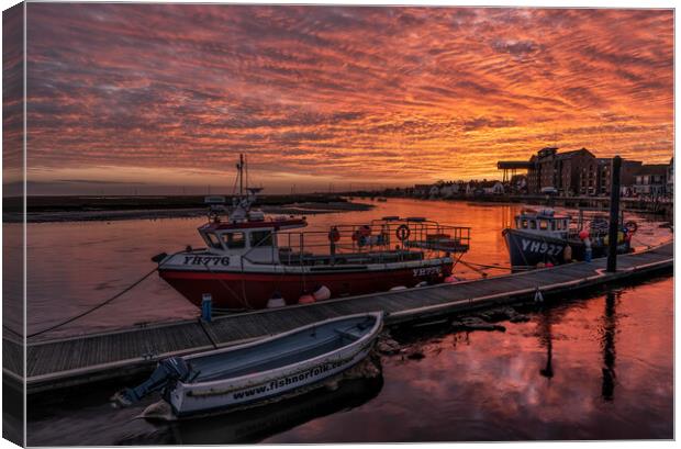 A fiery sky over Wells harbour Canvas Print by Gary Pearson