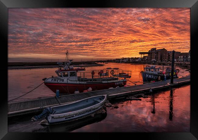 A fiery sky over Wells harbour Framed Print by Gary Pearson