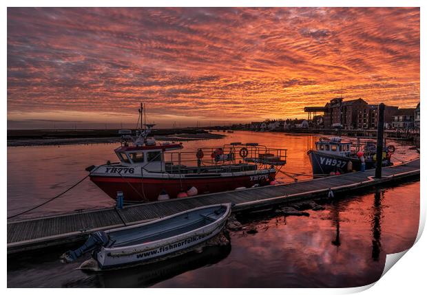A fiery sky over Wells harbour Print by Gary Pearson