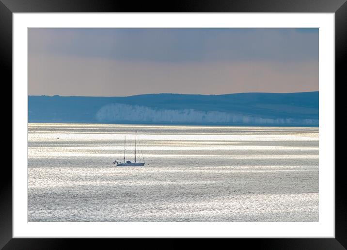 sailing boat at rest on a calm sea  Framed Mounted Print by tim miller