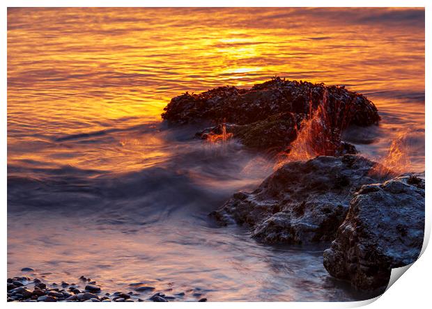 Sunset rocks with a splash Print by Rory Hailes
