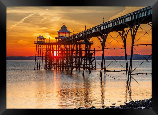 Clevedon Pier as the sun sets Framed Print by Rory Hailes