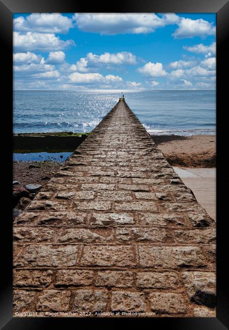 Pier of Tranquility Framed Print by Roger Mechan
