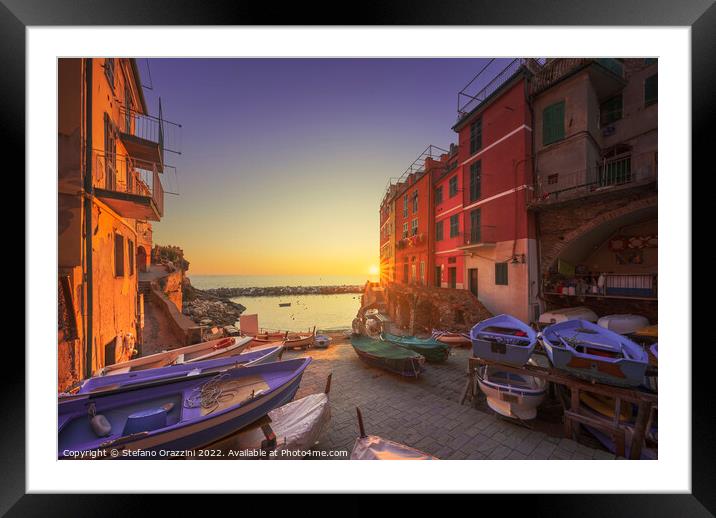 Riomaggiore village boats in the street at sunset. Cinque Terre Framed Mounted Print by Stefano Orazzini