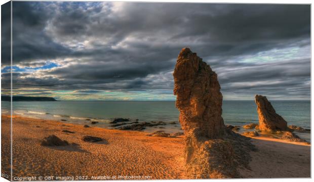 Cullen Beach Late Sun Rock Light Morayshire Scotland Canvas Print by OBT imaging