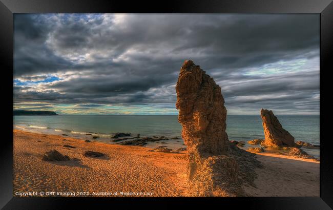 Cullen Beach Late Sun Rock Light Morayshire Scotland Framed Print by OBT imaging