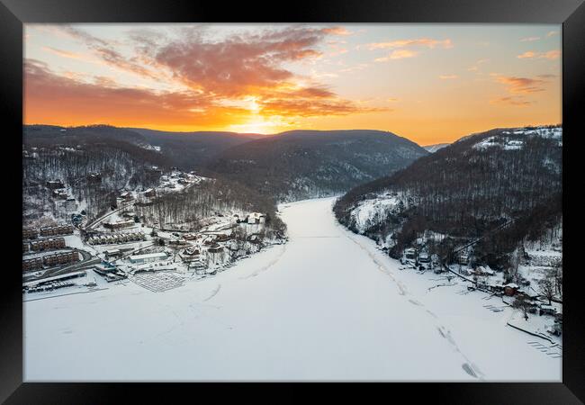 Aerial sunrise over frozen Cheat Lake Morgantown, WV Framed Print by Steve Heap