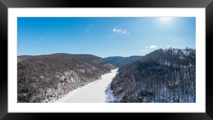 Aerial view up the frozen Cheat River in Morgantown, WV Framed Mounted Print by Steve Heap