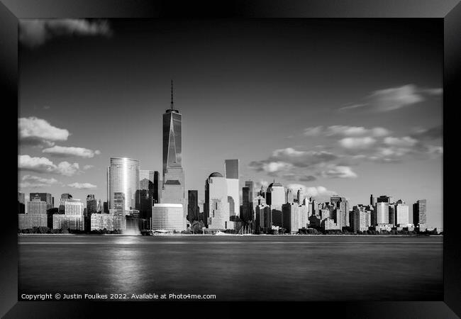 The Manhattan skyline from New Jersey, New York Framed Print by Justin Foulkes