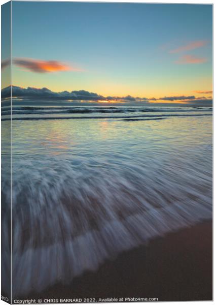 Waves At Sunset Canvas Print by CHRIS BARNARD