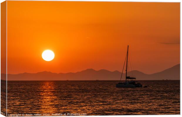 Catamaran moored in Krabi at sunset Canvas Print by Kevin Hellon