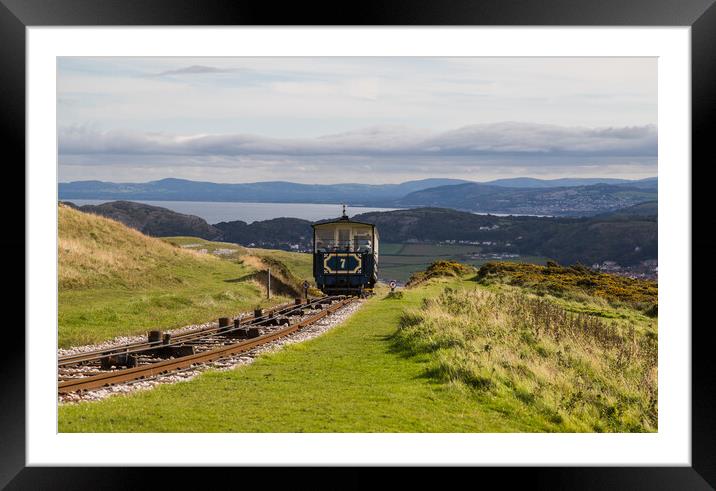 Great Orme tram departing the peak Framed Mounted Print by Jason Wells