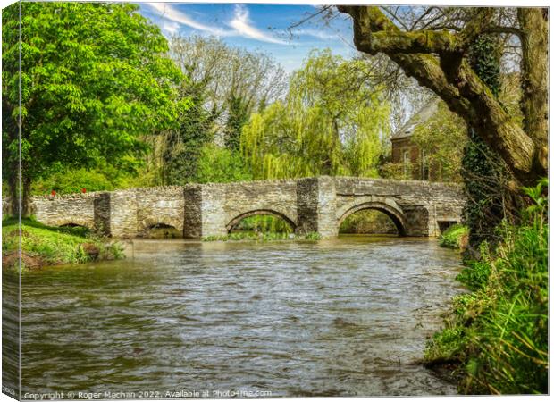 The Enchanting Arched Bridge of Clun Canvas Print by Roger Mechan