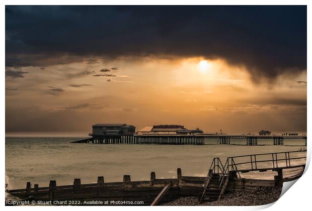 A sunset over Cromer pier in winter Print by Stuart Chard