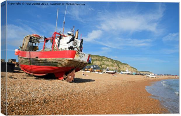 Boat on beach at Hastings Canvas Print by Paul Daniell