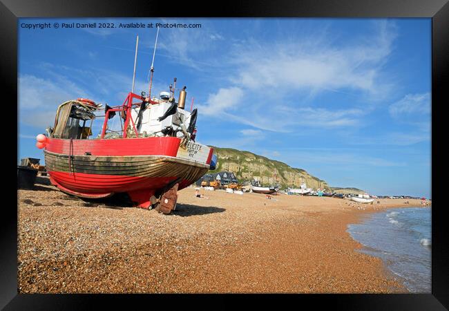 Boat on beach at Hastings Framed Print by Paul Daniell