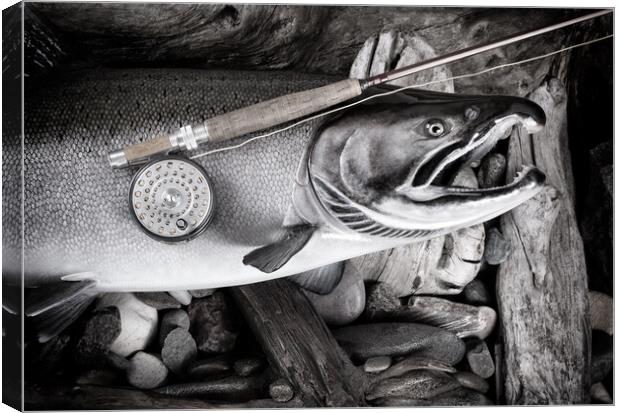 Vintage fly fishing equipment on large salmon in riverbed settin Canvas Print by Thomas Baker