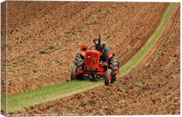 Ploughing the Land. Canvas Print by Glyn Evans