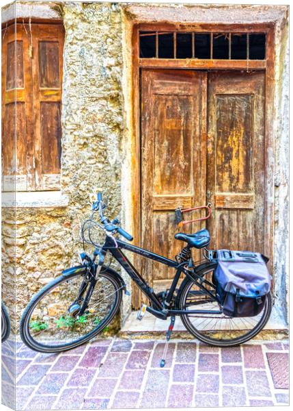 Bicycle and old doors Canvas Print by Kevin Hellon