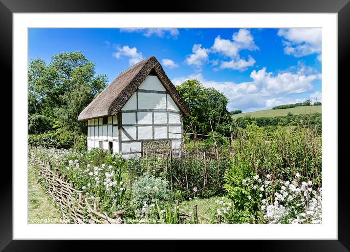 Enchanting Half-Timbered Cottage in a Blossoming G Framed Mounted Print by Roger Mechan