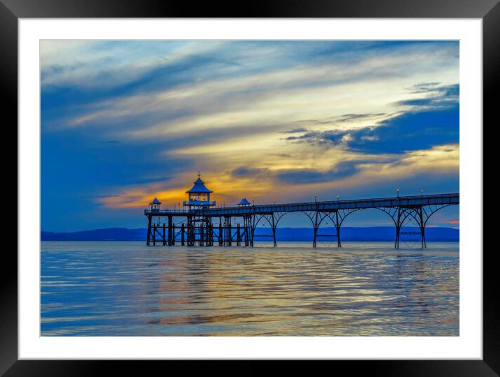 Clevedon Pier on a calm and tranquil evening Framed Mounted Print by Rory Hailes