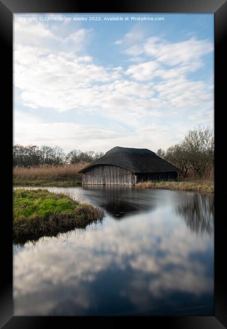 Reflections on Hickling Broad Framed Print by Christopher Keeley
