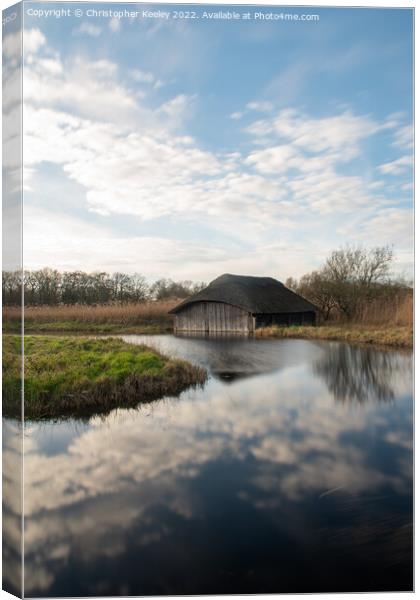 Hickling Broad boat house Canvas Print by Christopher Keeley
