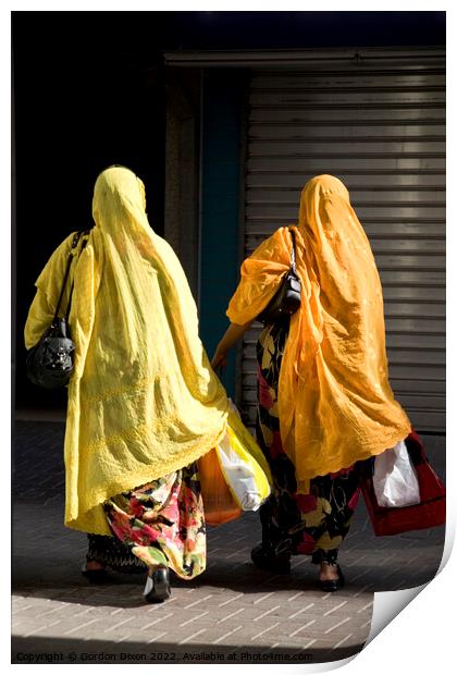 Ladies shopping in Dubai brightly coloured Print by Gordon Dixon