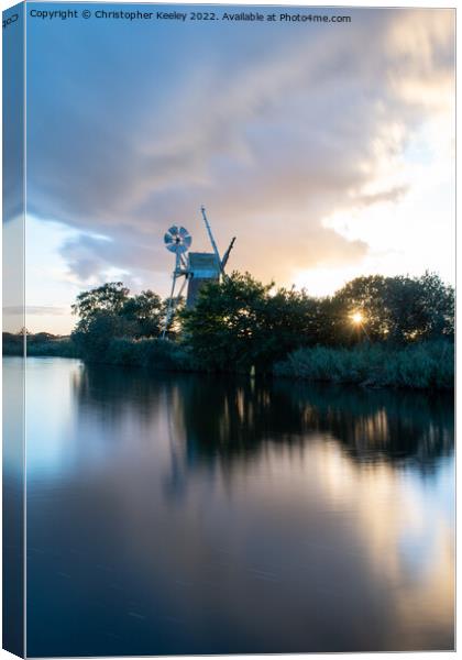 Sunset at Turf Fen windpump Canvas Print by Christopher Keeley