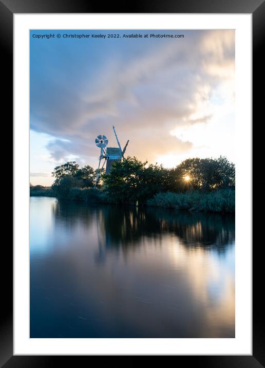 Sunset at Turf Fen windpump Framed Mounted Print by Christopher Keeley