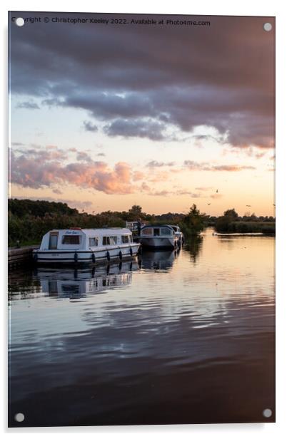 Sunset over Norfolk Broads boats Acrylic by Christopher Keeley