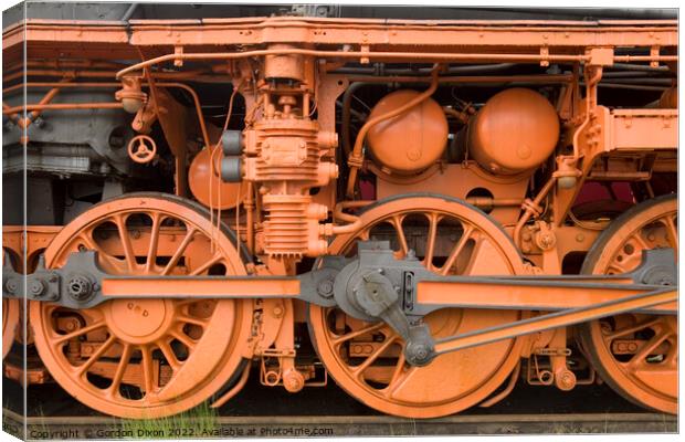 Brightly painted close up of a locomotive Canvas Print by Gordon Dixon