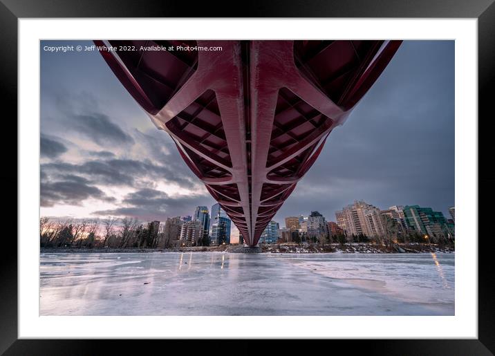 Peace Bridge over frozen Bow River Framed Mounted Print by Jeff Whyte