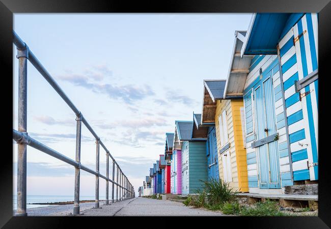 Looking up at the Cromer beach huts Framed Print by Jason Wells