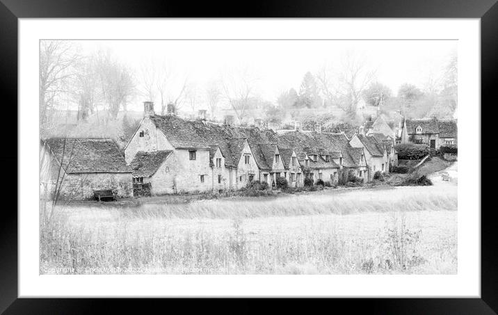 Arlington Row cottages, Bibury, in the Cotswolds Framed Mounted Print by Linda Webb
