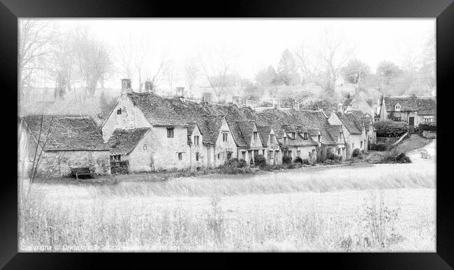 Arlington Row cottages, Bibury, in the Cotswolds Framed Print by Linda Webb