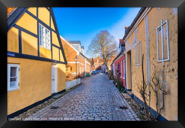 Cobbled streets in the old medieval city Ribe, Denmark Framed Print by Frank Bach
