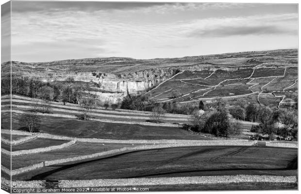 Malham Cove and surrounding fields monochrome Canvas Print by Graham Moore