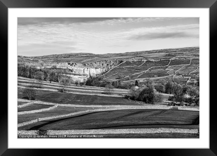 Malham Cove and surrounding fields monochrome Framed Mounted Print by Graham Moore