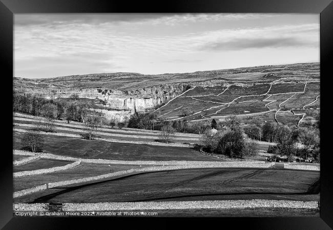 Malham Cove and surrounding fields monochrome Framed Print by Graham Moore