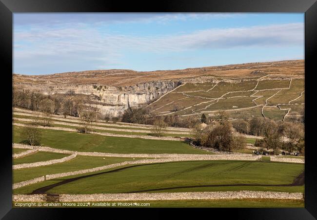 Malham Cove and surrounding fields Framed Print by Graham Moore