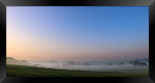 Misty morning sunrise Framed Print by David McGeachie