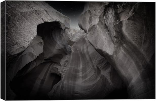 Antelope Canyon rock formation in Arizona during early night  Canvas Print by Thomas Baker