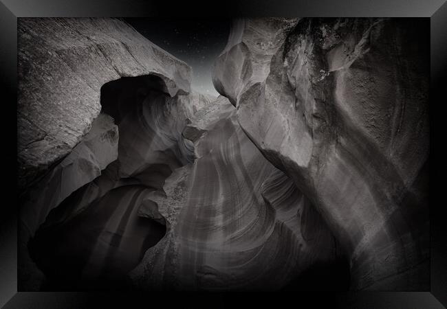 Antelope Canyon rock formation in Arizona during early night  Framed Print by Thomas Baker