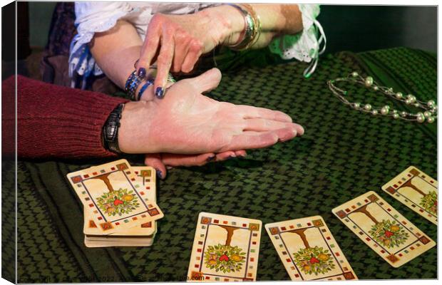 Palm reading Canvas Print by Clive Wells