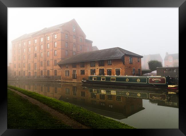 Mist over the old warehouse Framed Print by Clive Wells