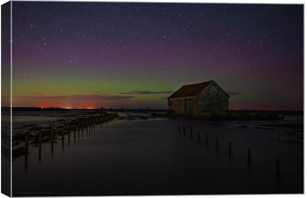 The Northern lights over the old coal barn at Thornham  Canvas Print by Gary Pearson