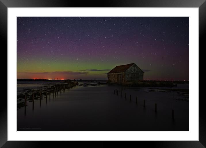 The Northern lights over the old coal barn at Thornham  Framed Mounted Print by Gary Pearson